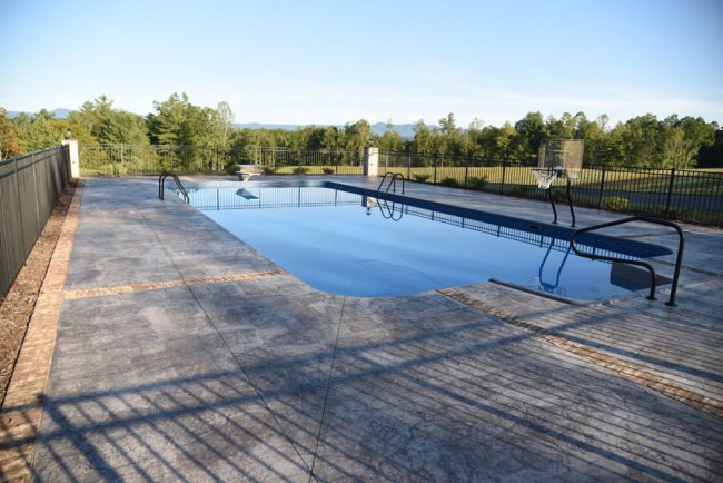 Colt Simmons Contruction Custom Built In-Ground Pool, Patio And Fence.